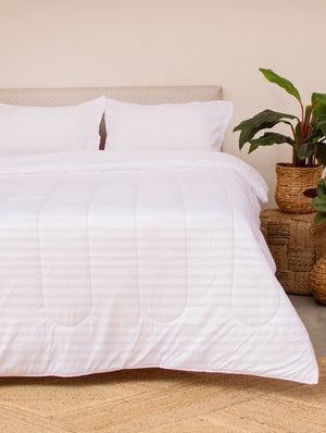 Decorar alcoba con un Comfort embozado blanco 