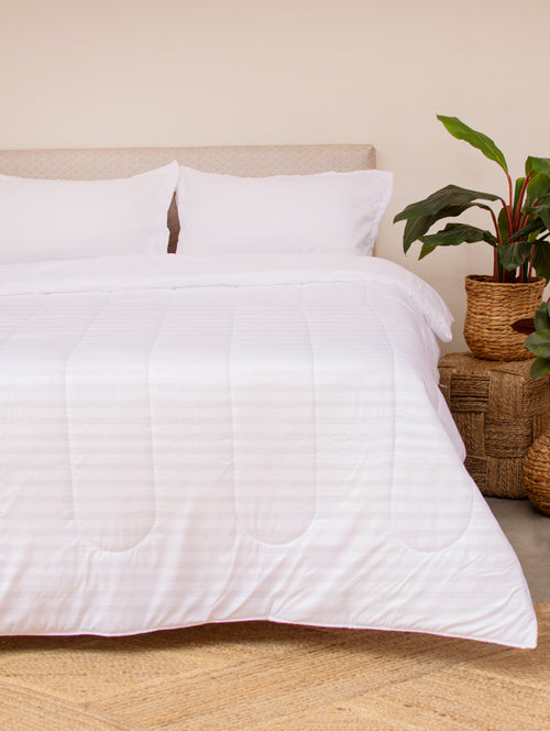 Decorar alcoba con un Comfort embozado blanco 