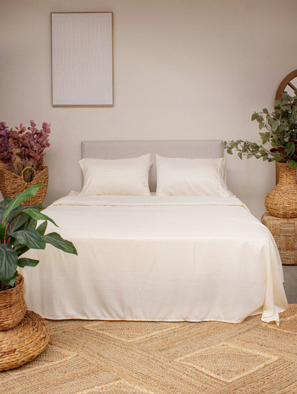 Juego de sábanas dobby con vivo satin 